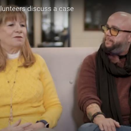 CASA volunteers discuss a case